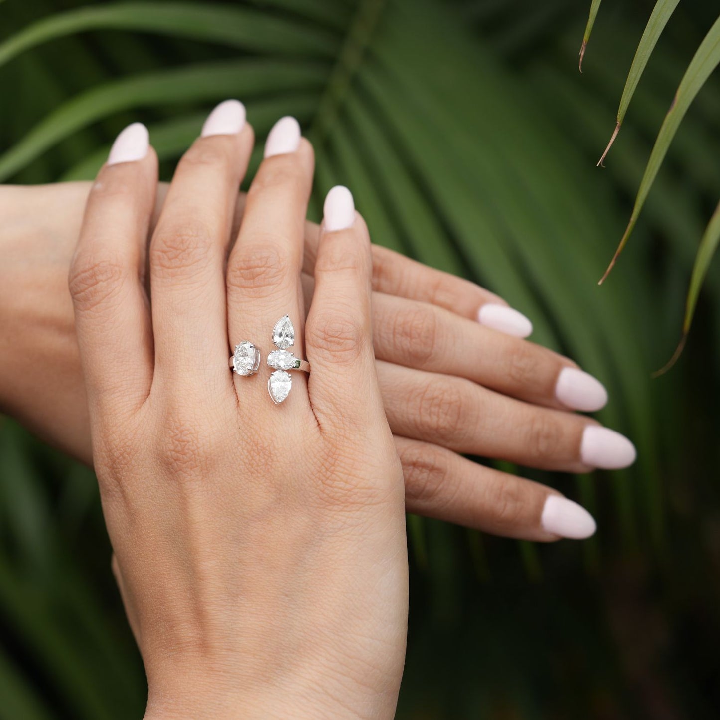 4 Stone Oval Cut and Pear Shaped Ring