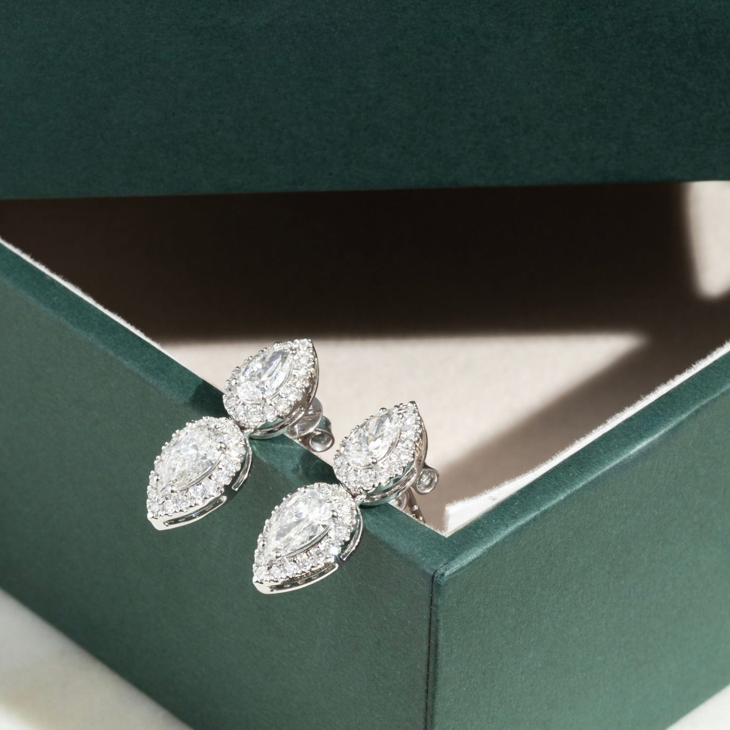 Delicate Earrings with Pear Shaped Sparklers